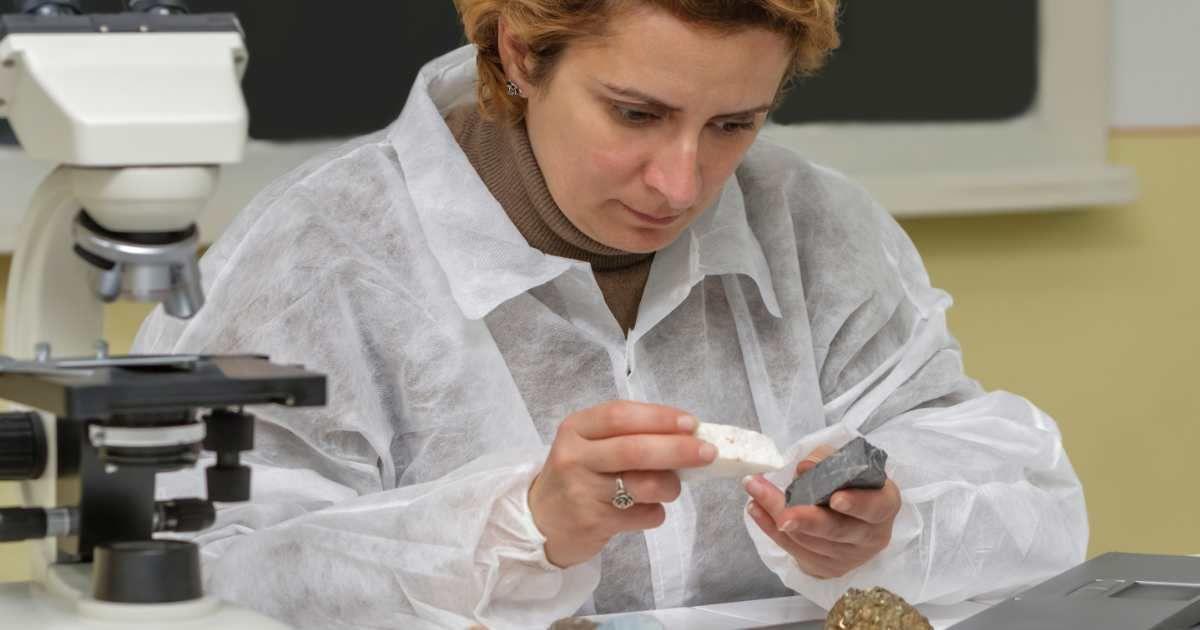 A geologist is testing a rock in the lab. (Representative Cover Image Source: Getty Images | Razvan)
