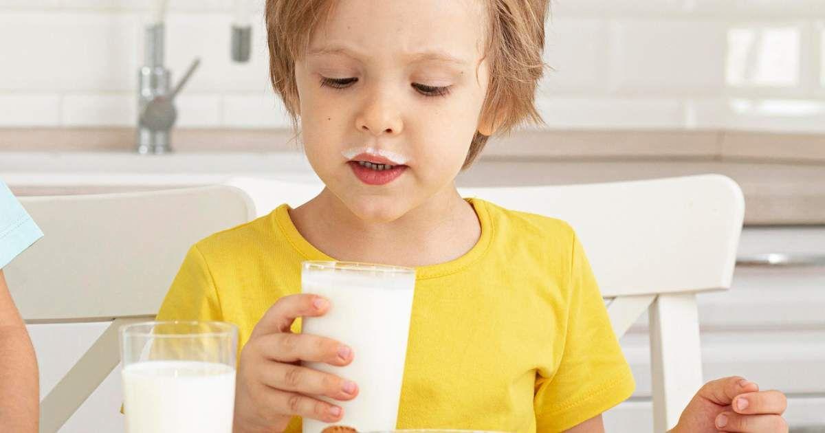 A little boy is drinking milk in the kitchen.  (Representative Cover Image Source: Freepik)