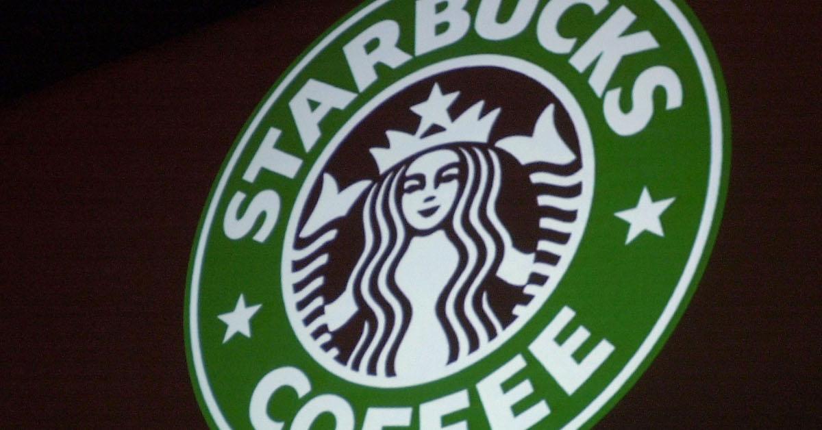 Starbucks Coffee logo projected on a wall