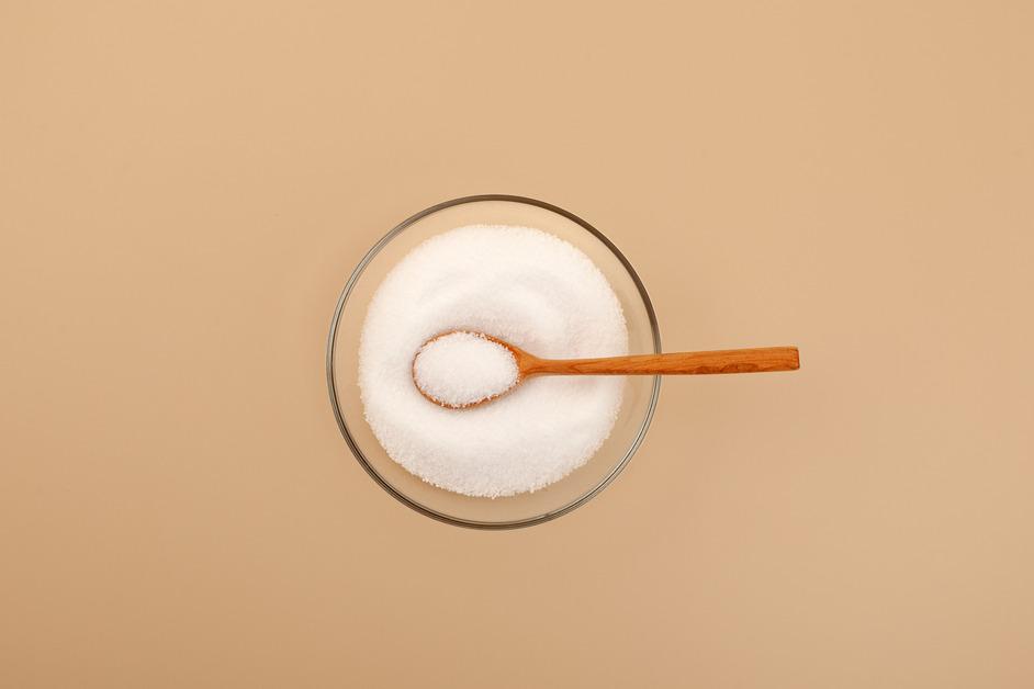 Stock photo of stevia in a bowl with a spoon.