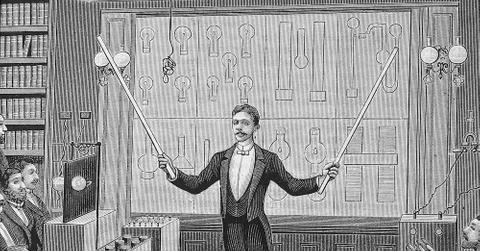 An illustration of Nikola Tesla lecturing for the French Physical Society and The International Society of Electricians, circa 1885.