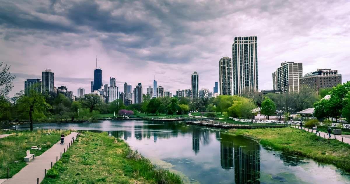 A park filled with greenery amid skyscrapers in a city. (Representative Cover Image Source: Pexels | Nancy Bourque)