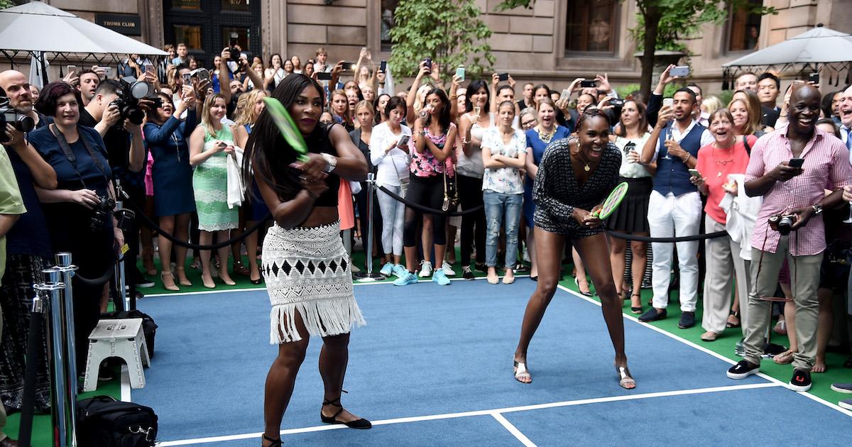 Venus and Serena Williams on a court