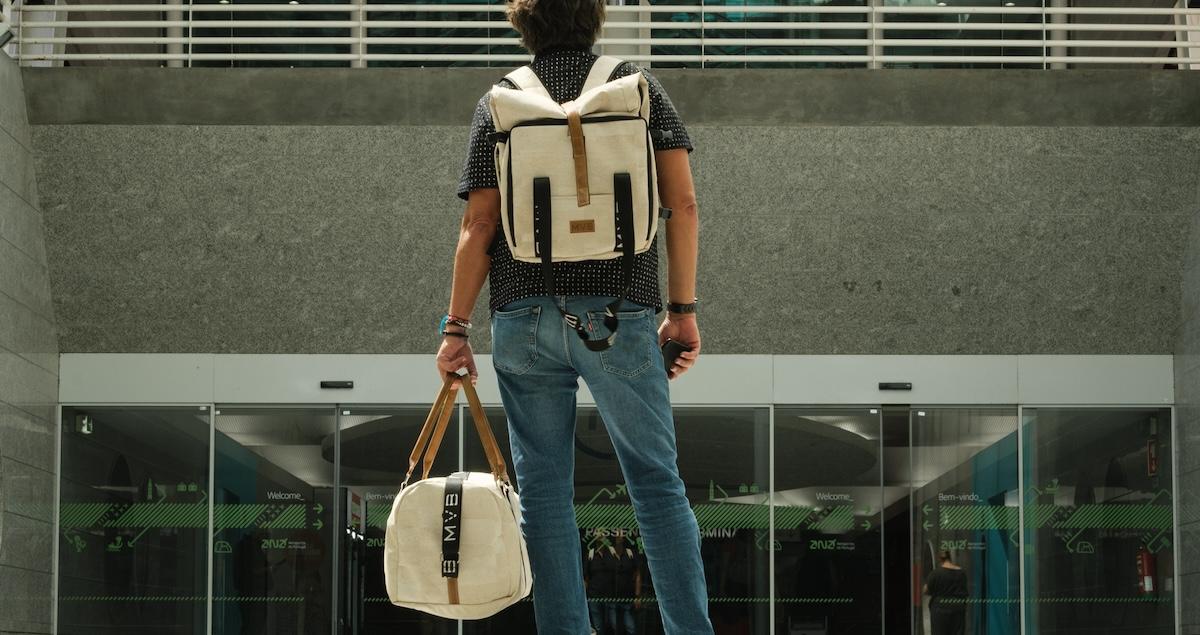 Man with duffel and backpack by My Vegan Bags