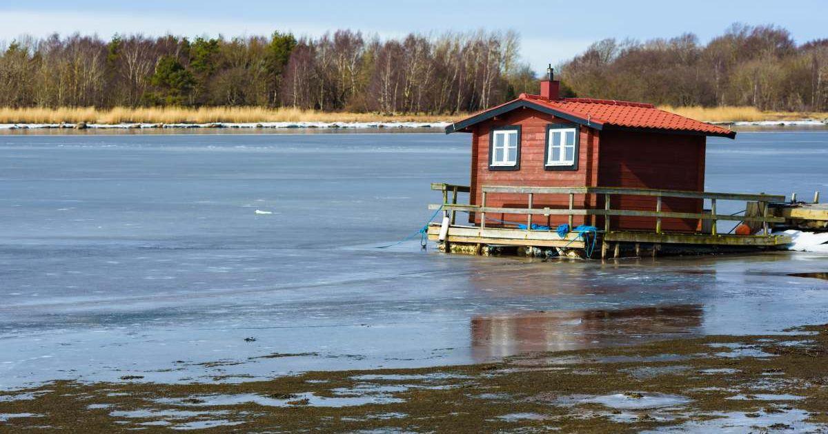 Moored floating sauna in thawing ice (Representative Cover Image Source: Getty | Reimphoto)