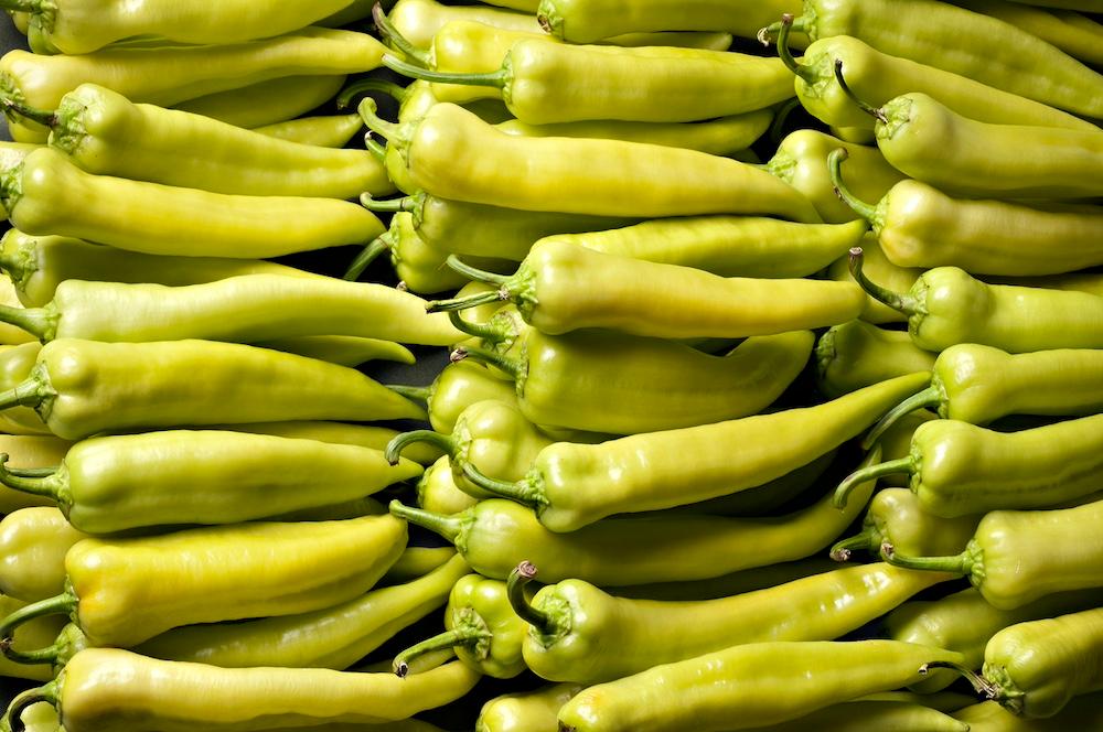 Stacks of banana peppers.