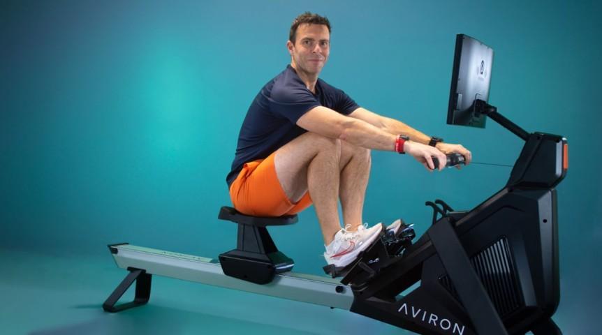 Indoor rowing gold medalist and world record-holder John Steventon uses an ergometer.