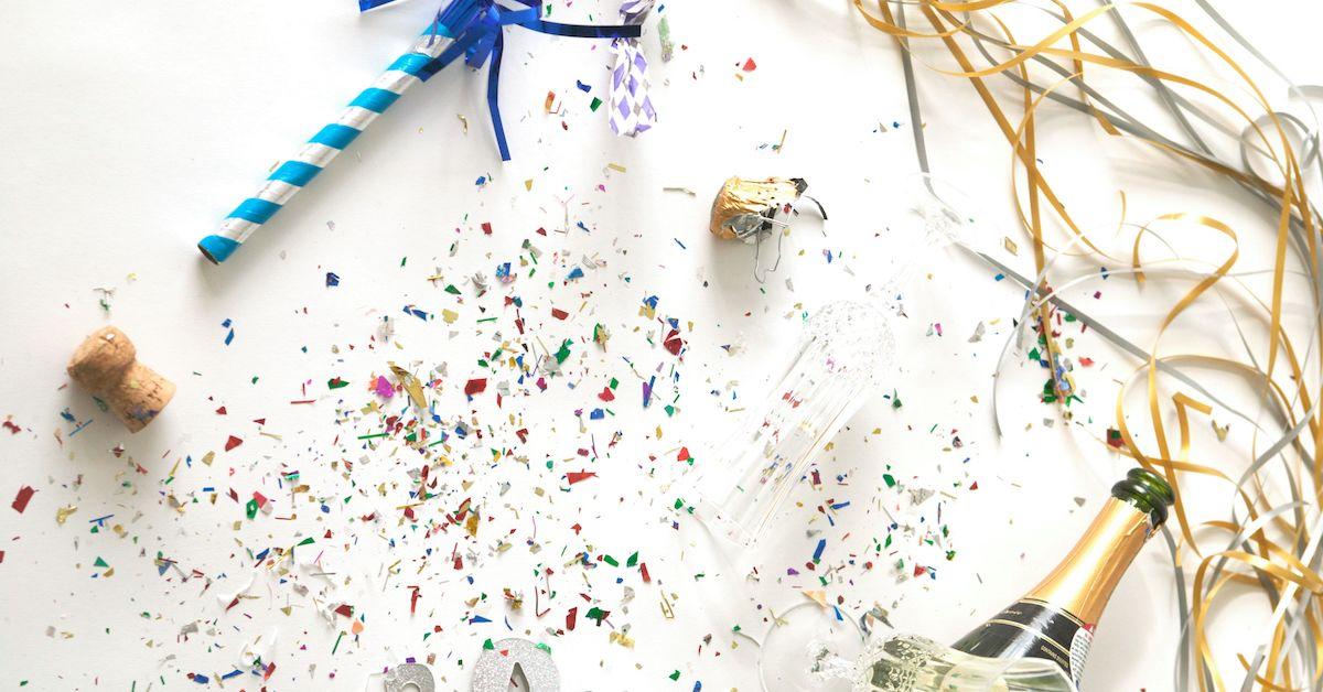 Piles of confetti and waste on the ground.