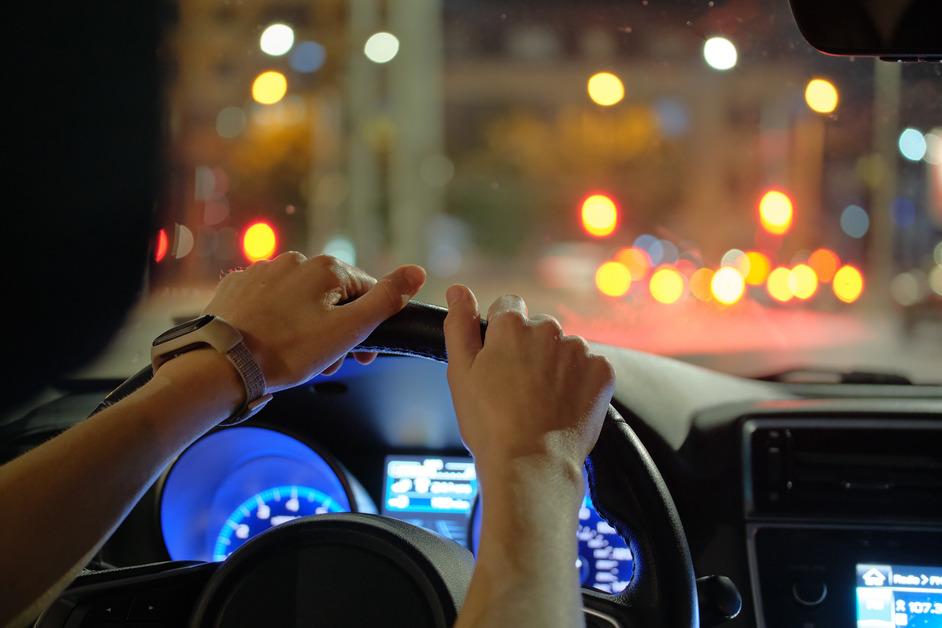 Person with hands on the wheel