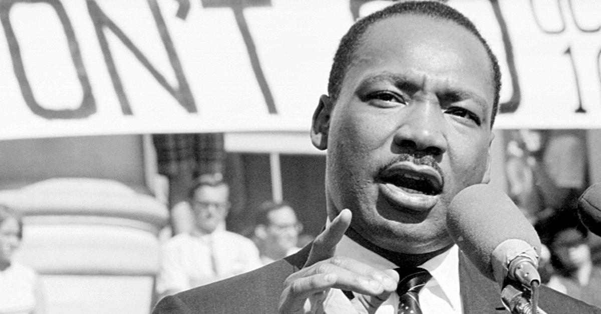 Closeup of Martin Luther King Jr. making a speech in a black-and-white image.