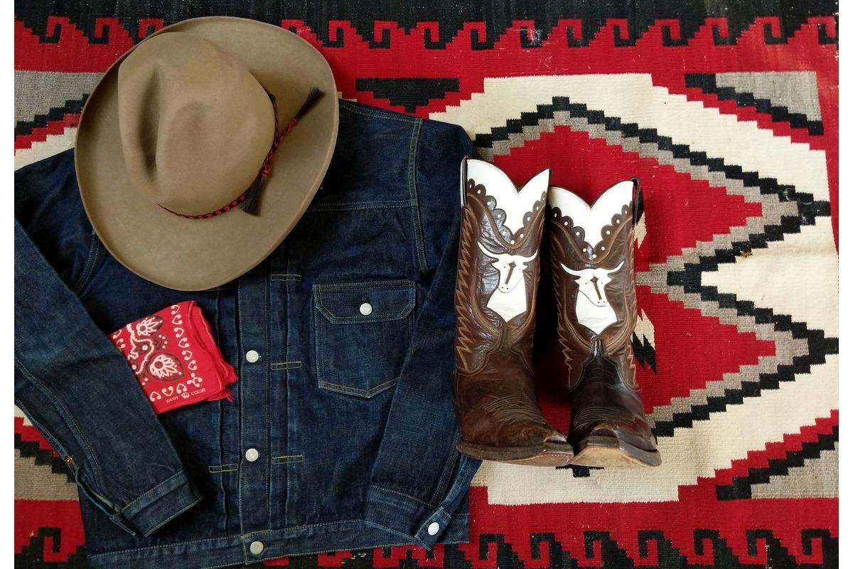 A cowboy hat and cowboy boots at Bozeman Vintage