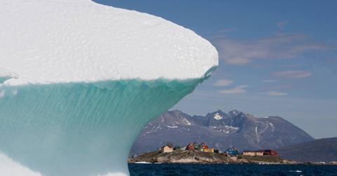 A giant iceberg near a coastal town. (Representative Cover Image Source: Getty Images | Paul Souders)