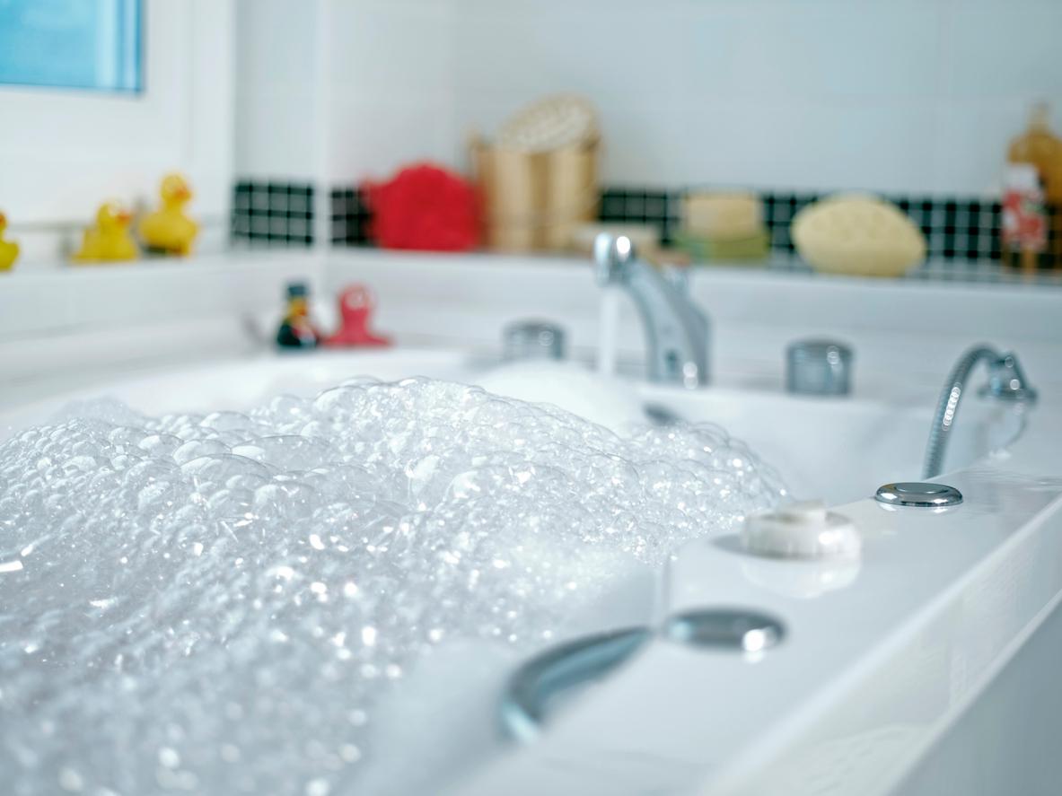 Close up view of bubbles in a bathtub.