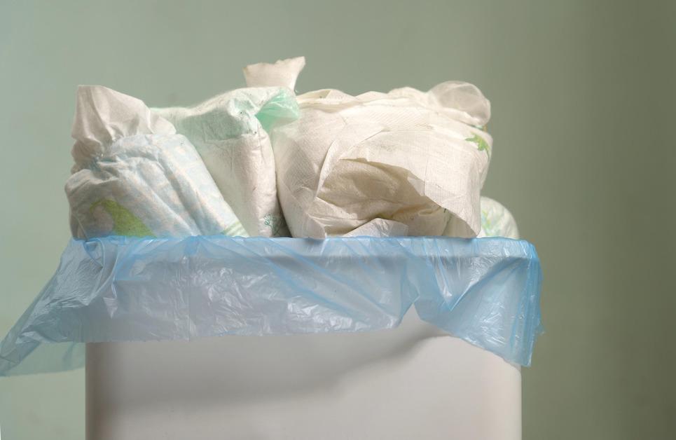 Stock photo of dirty diapers in the trash. 