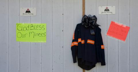 Miners jacket hangs on a wall in memorial for Upper Big Branch Mine disaster victims.