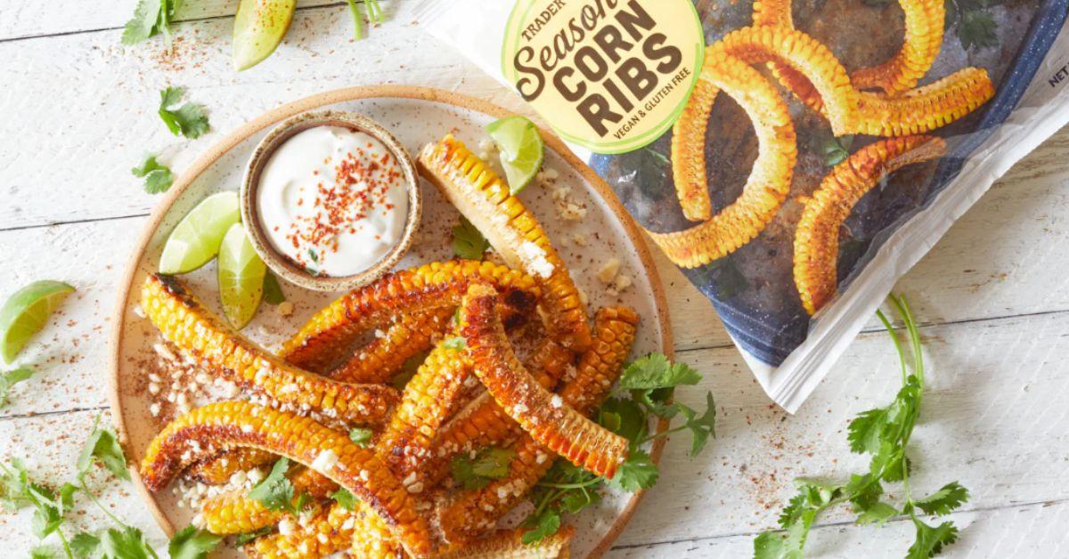 Plate of Trader Joe's Seasoned Corn Ribs next to the package