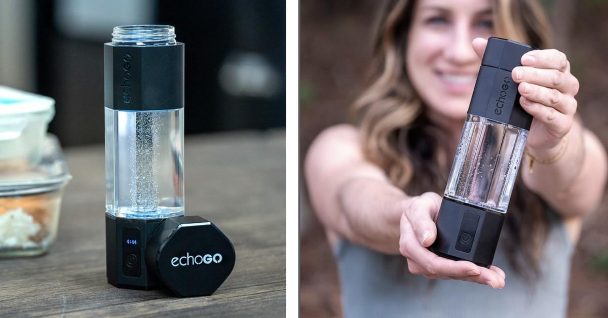 Echo water bottles on display on a table in and a woman's hands