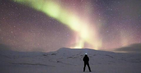 A person looking at the stars in Antarctica (Cover image source: Pixabay| Noel_Bauza)