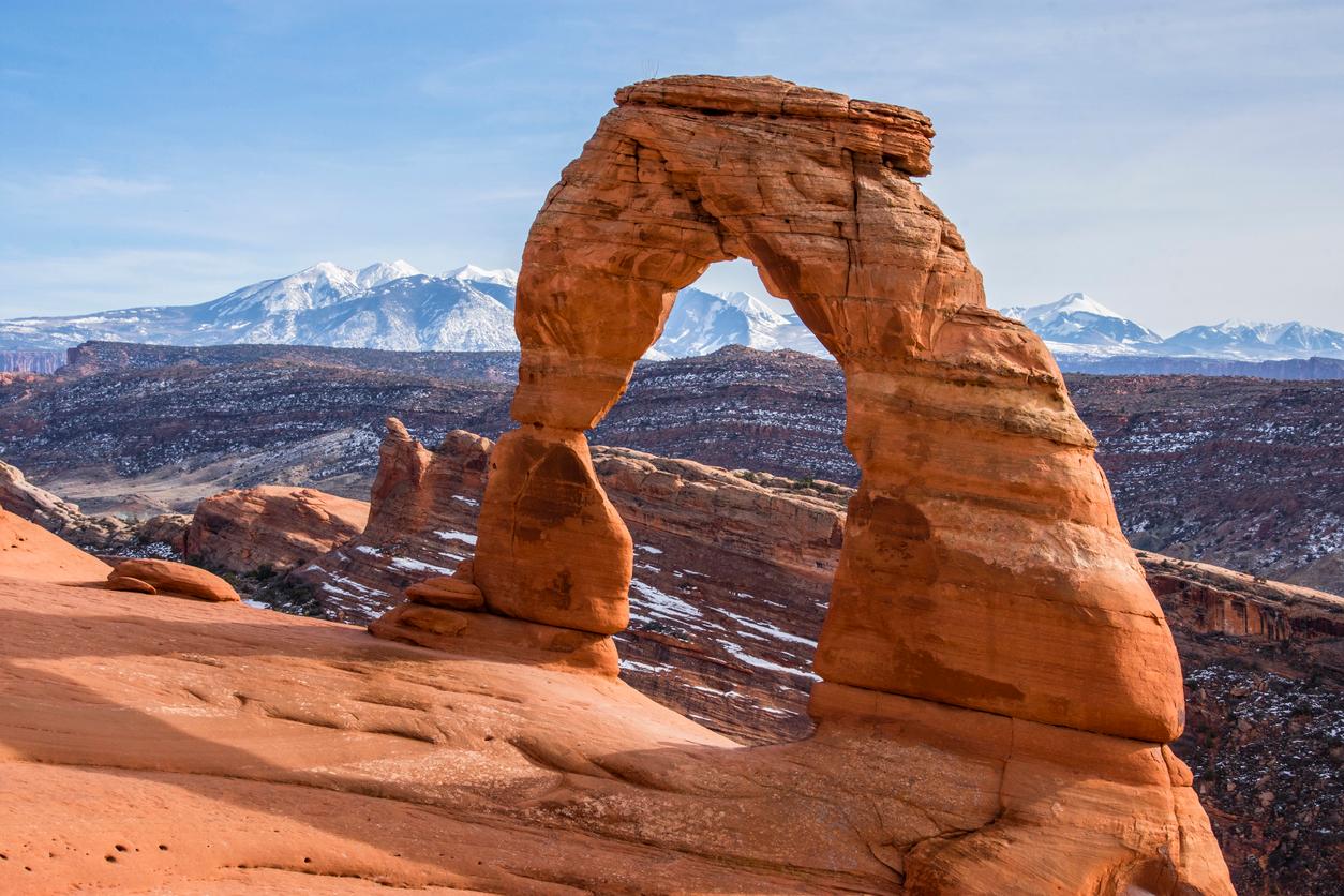 Delicate Arch is pictured during the winter with the La Sal Mountains in the background at Arches National Park.