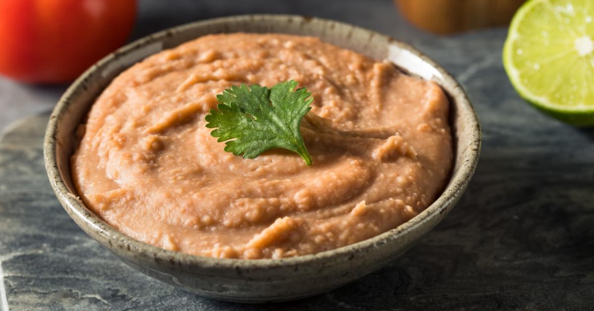 A bowl of refried beans.