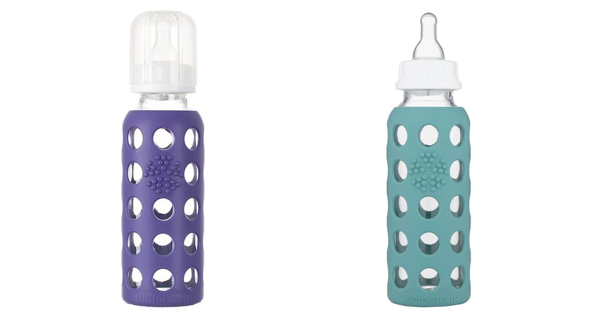 two glass baby bottles with silicone sleeves in purple and teal