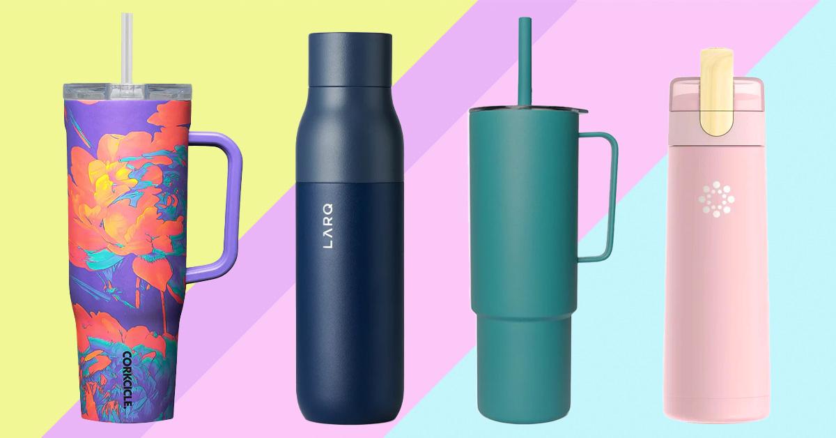 four reusable water bottles on a colorful background