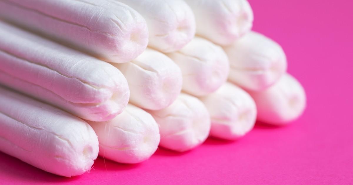 Closeup of a pyramid of tampons on a pink background