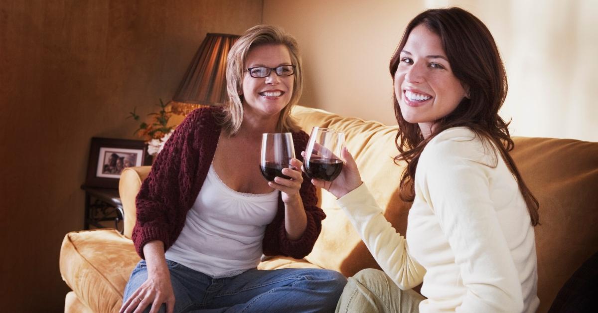 Two women drinking red wine. 