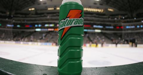 A Gatorade water bottle sits on the boards at the bench during an NHL game
