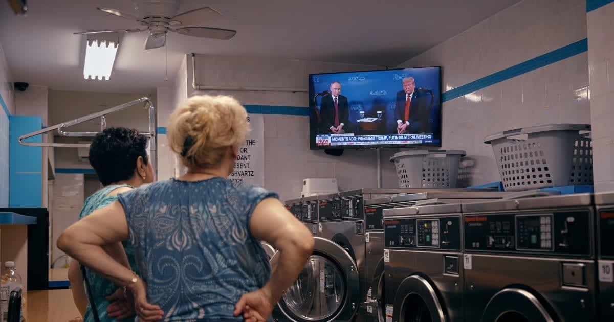 Women stand inside a laundromat. (Representative Cover Image Source: Getty Images | Andres Kudacki)