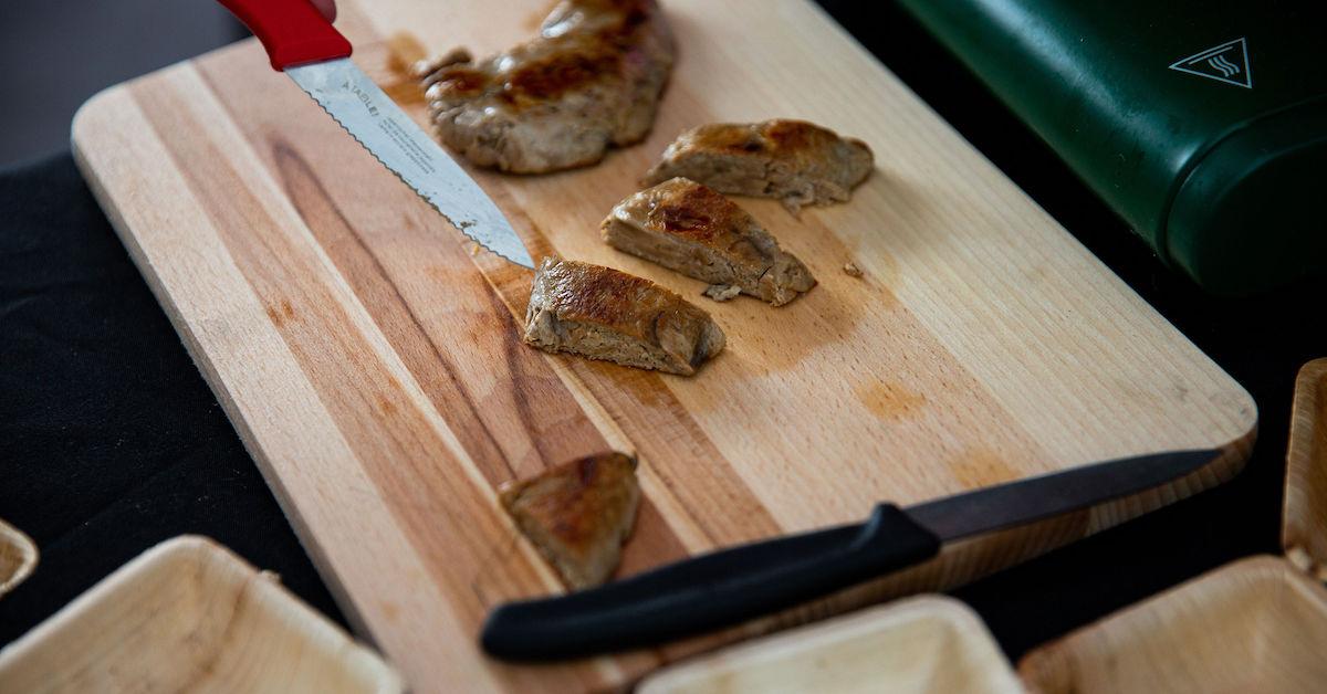 Bosque Foods chicken on a cutting board at the Vegan Women Summit