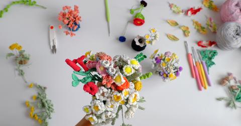 Overhead view of a bouquet of crochet flowers.