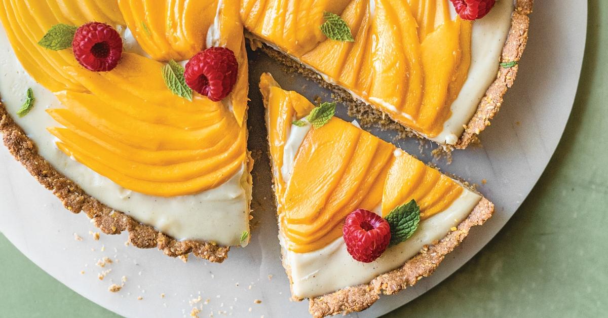 Photo of cookbook author and content creator Nisha Vora's Chai Spiced Custard Tart with Mango