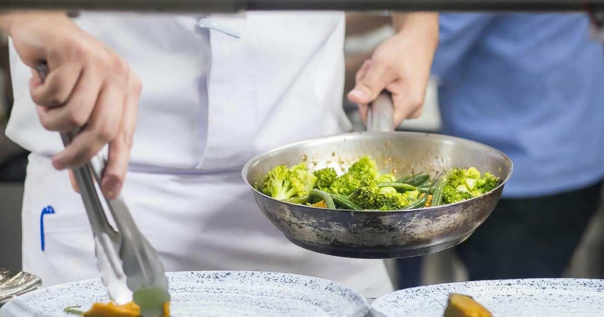 A person cooking broccoli in a pan. (Representative Cover Image Source: Pexels | Nick Souza)