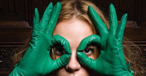 Girl wearing leather gloves