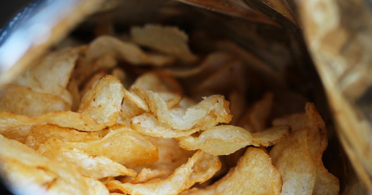 Close-up photograph of a bag of potato chips.