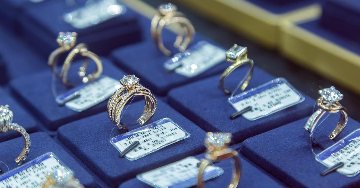 A view of seven diamond rings on display, for sale at a trade fair for synthetic diamonds in Zhengzhou in central China's Henan province.