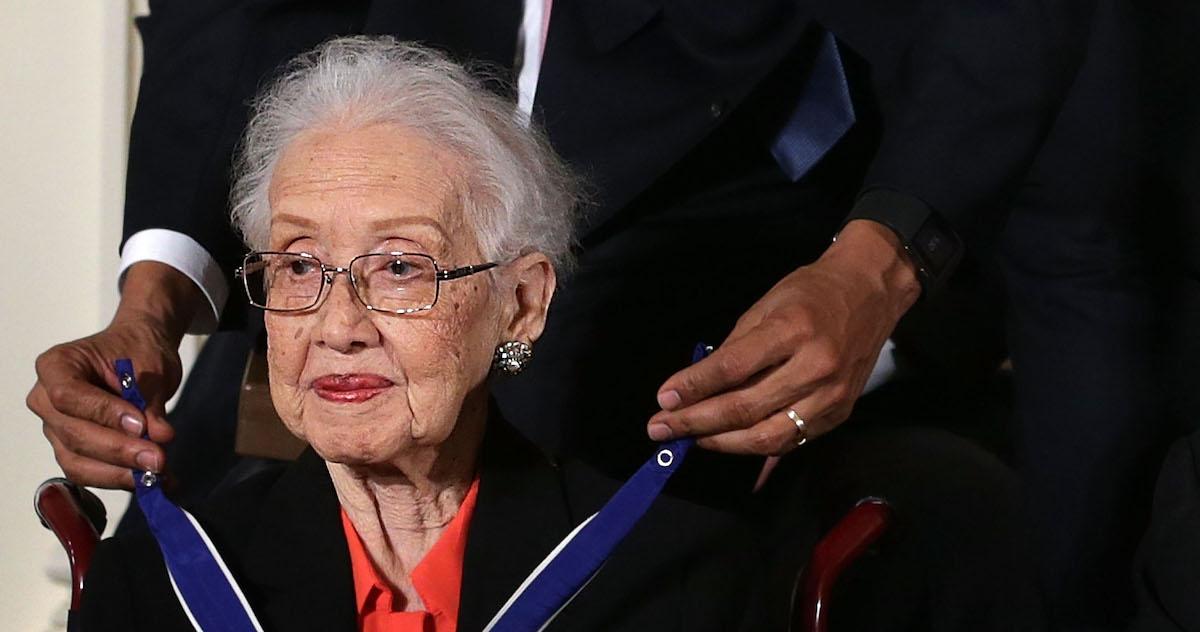 U.S. President Barack Obama places the Presidential Medal of Freedom around the neck of former NASA mathematician Katherine Johnson on Nov. 24, 2015 at the White House.