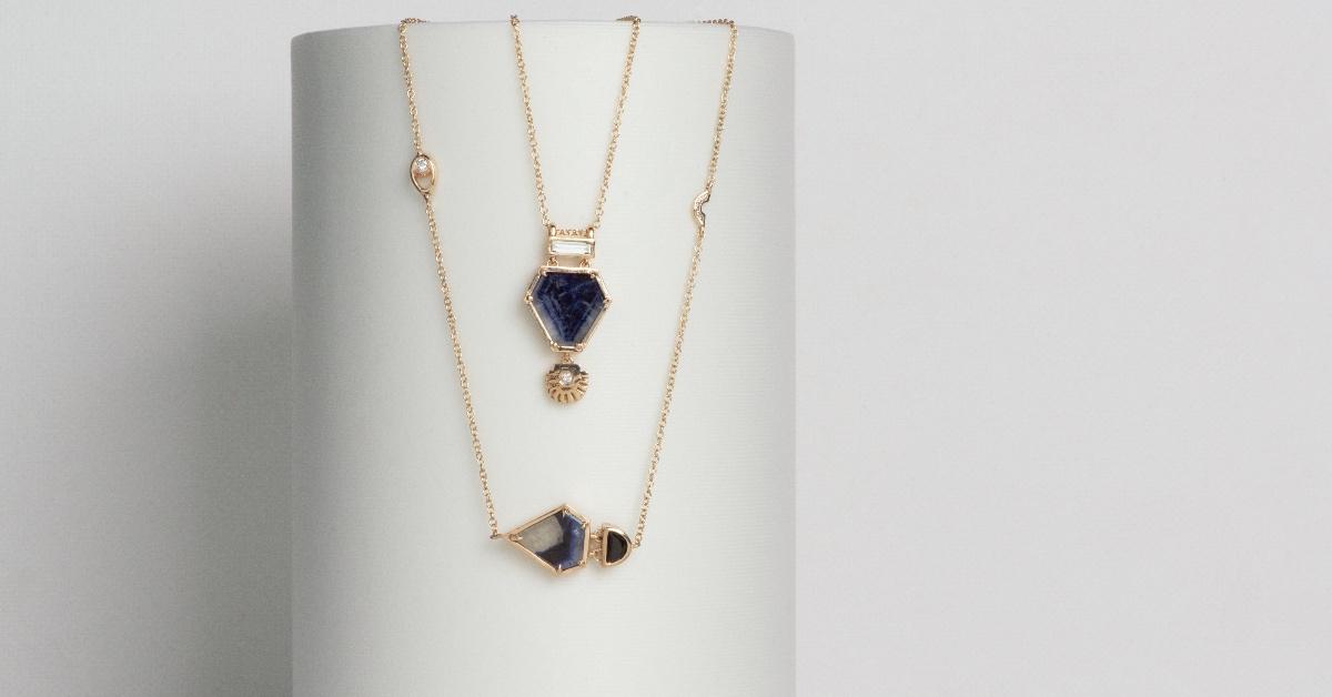 Photograph of blue and gold necklaces. 