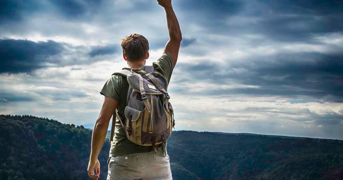 Young man on the hilltop of a national park (Representative Cover Image Source: Getty Images | Tais Policanti)