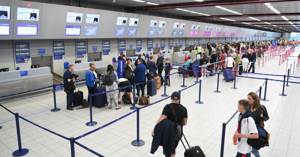 People gather at the airport
