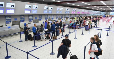 People gather at the airport