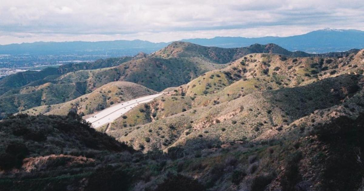 A film photo of the Verdugo mountains on a cloudy day.