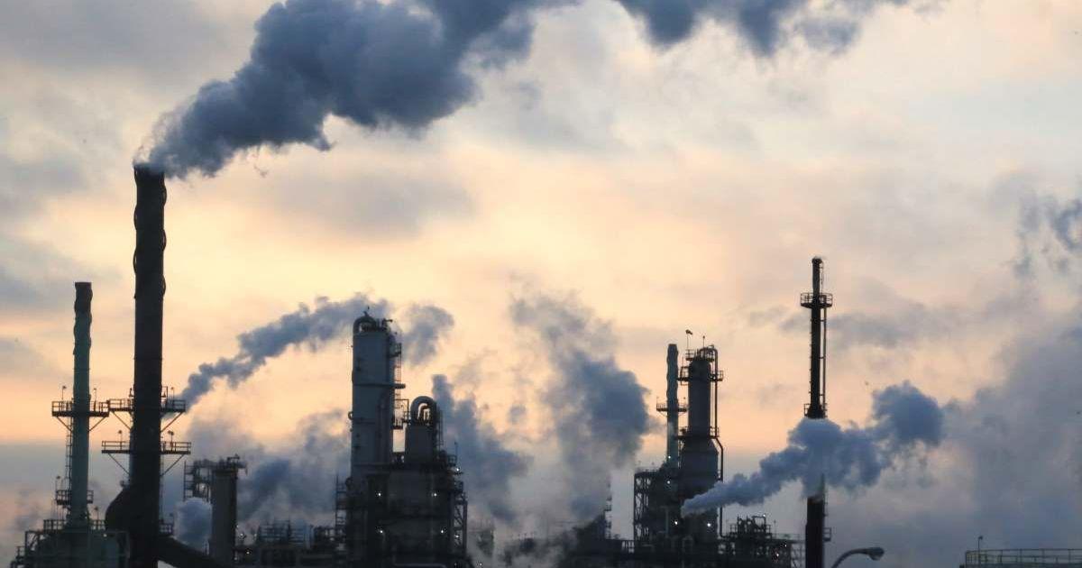 Smoke billowing from factories showing human-caused climate change (Representative Image Source: Getty Images | Douglas Sacha)