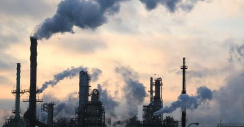 Smoke billowing from factories showing human-caused climate change (Representative Image Source: Getty Images | Douglas Sacha)