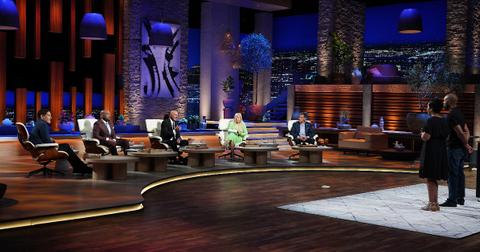 Meat The Mushroom co-founders Marvin and Aleah Rae Montague standing in front of panel on ABC's 'Shark Tank'