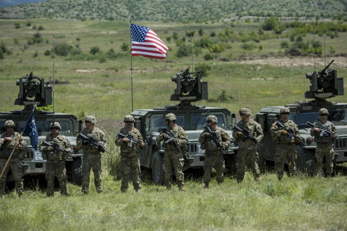 U.S. military members standing at arms