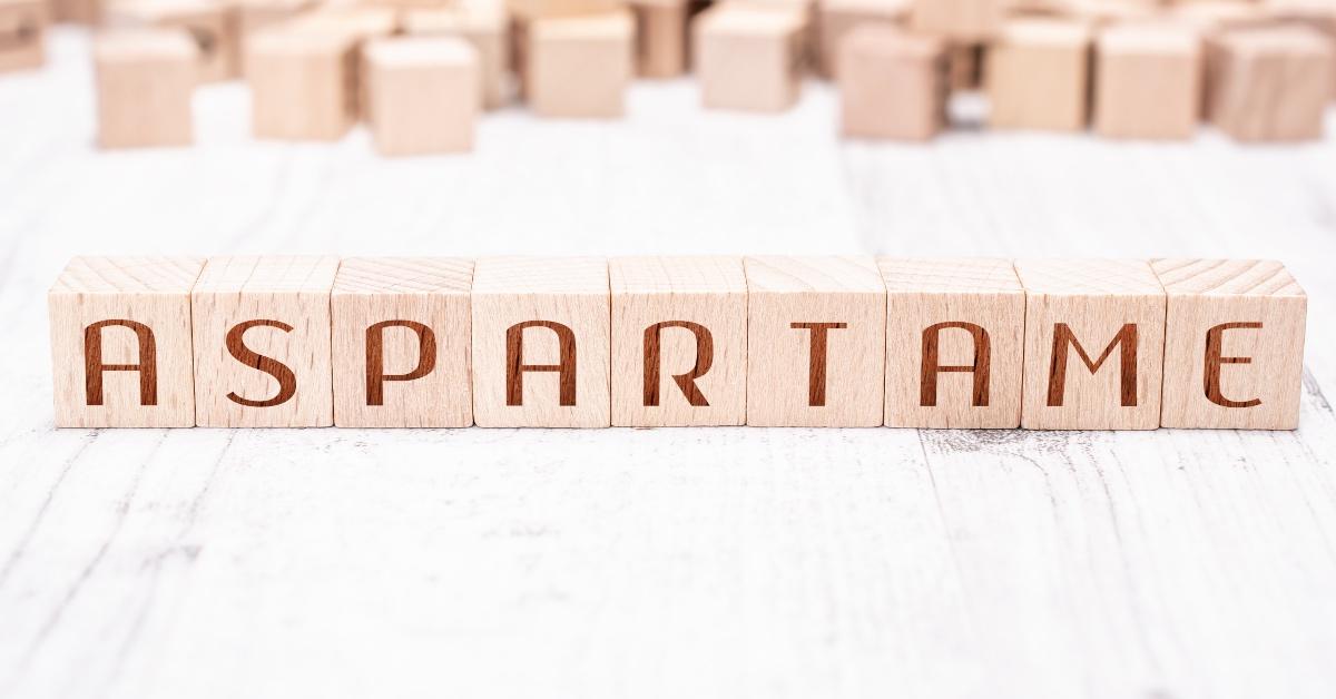 Wooden blocks spelling out the word aspartame.