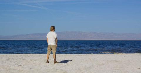 A man looking at the Salton Sea. (Representative Cover Image Source: Getty Images | Ianmcdonnell)