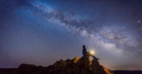 Stargazer looks up at the night sky